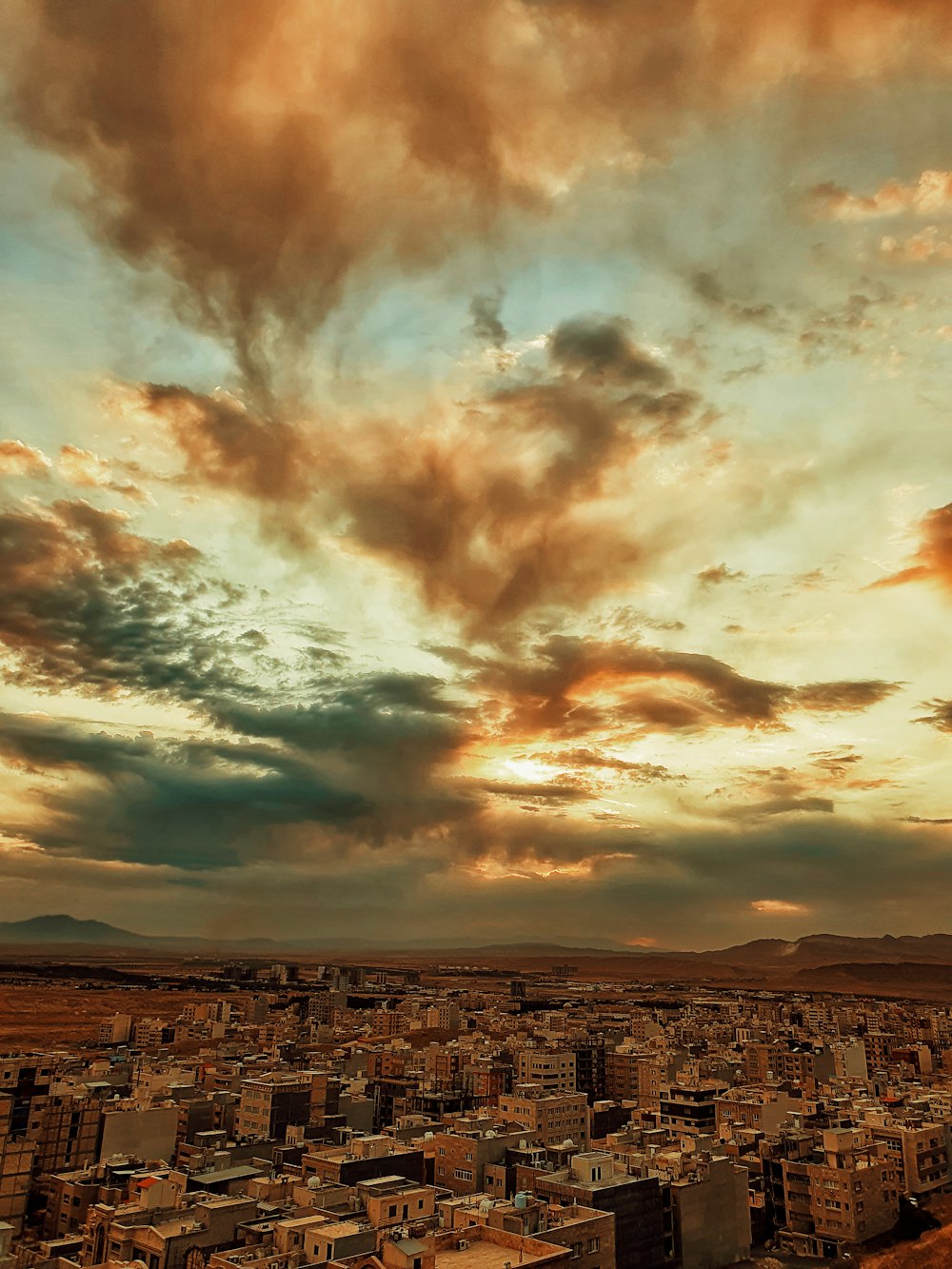 city under cloudy sky during daytime