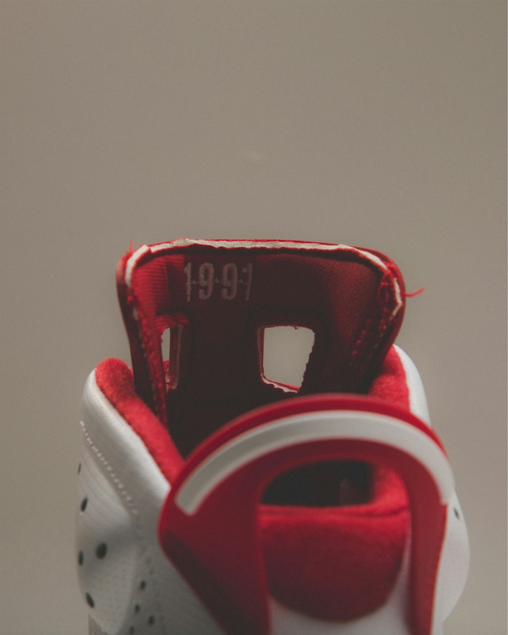 red and white nike shoe