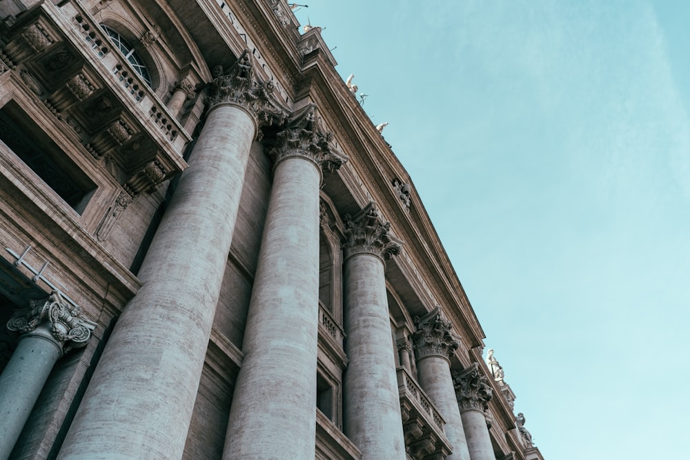 low angle photography of gray concrete building