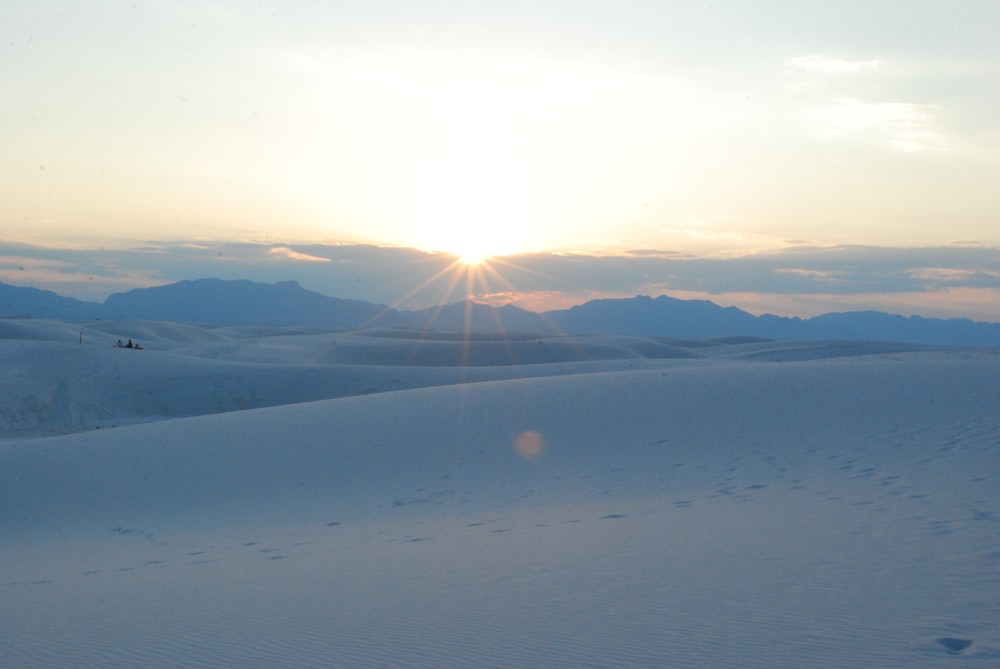 sun setting over the mountains