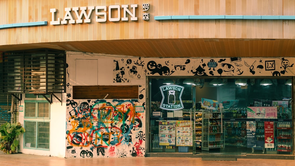 brown wooden wall with graffiti