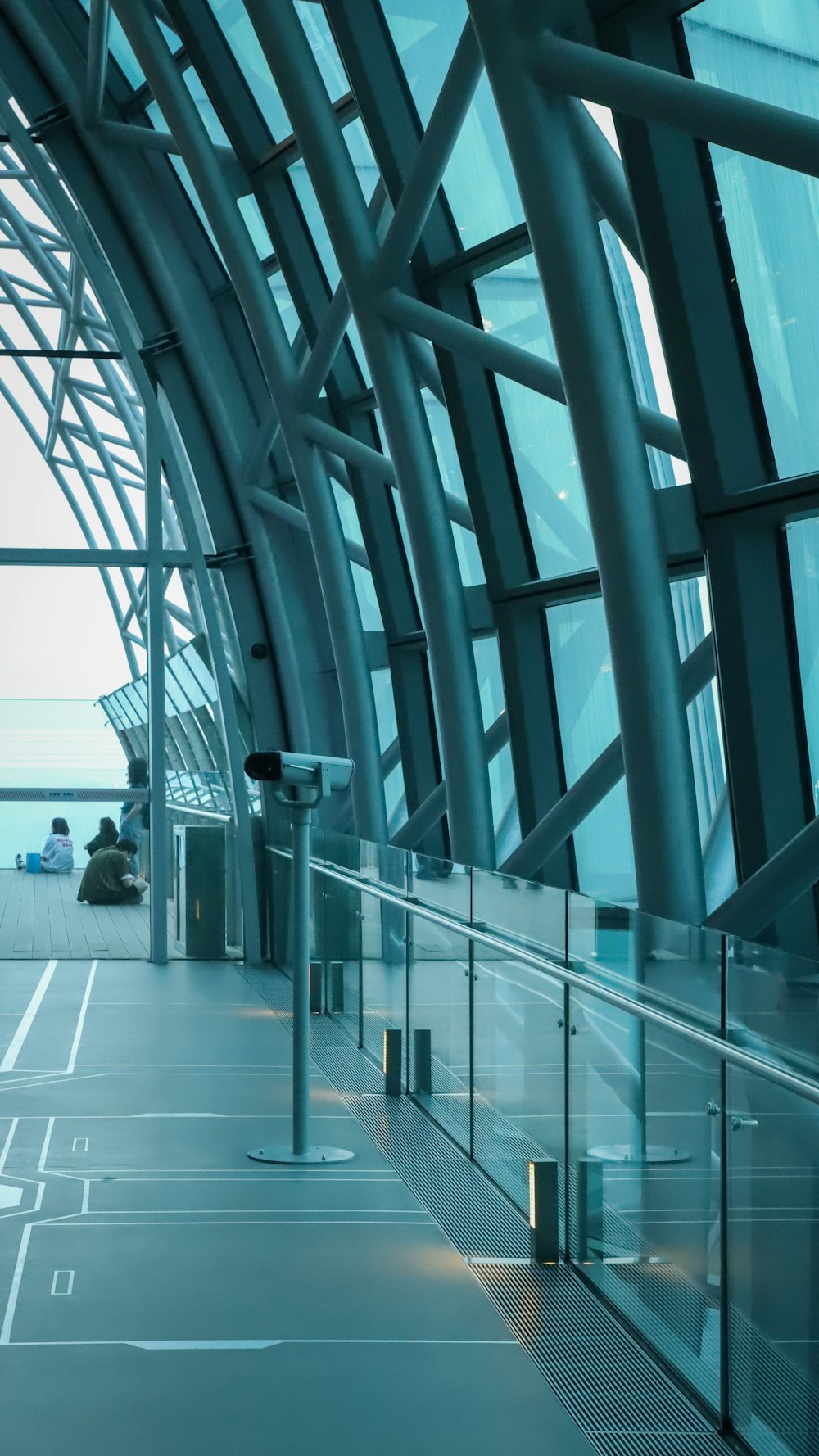 people walking on white floor tiles