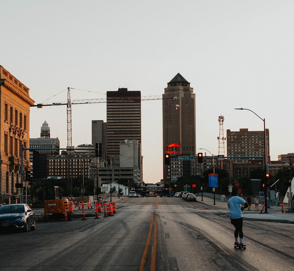 cars on road near buildings during daytime