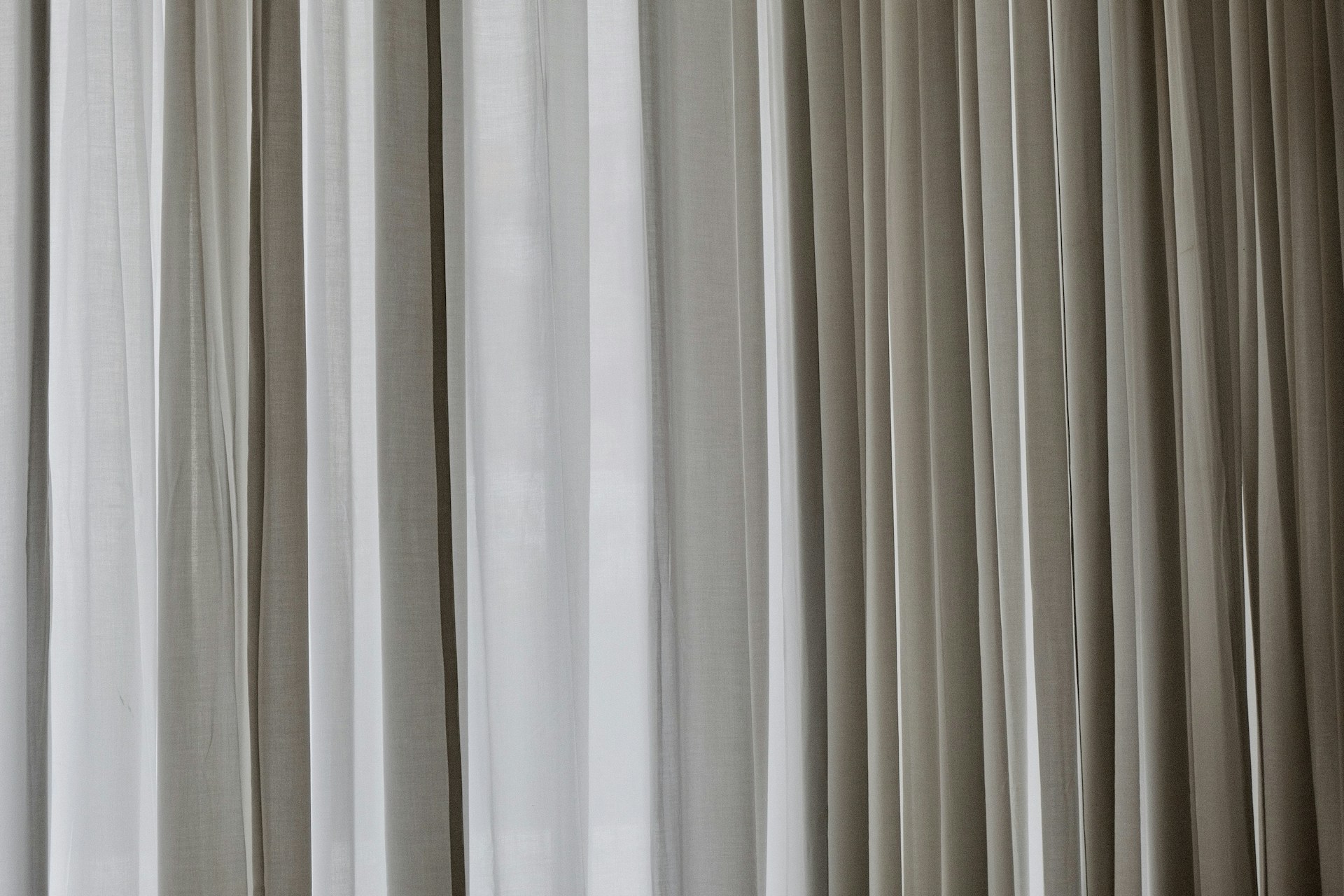 white and gray window curtain