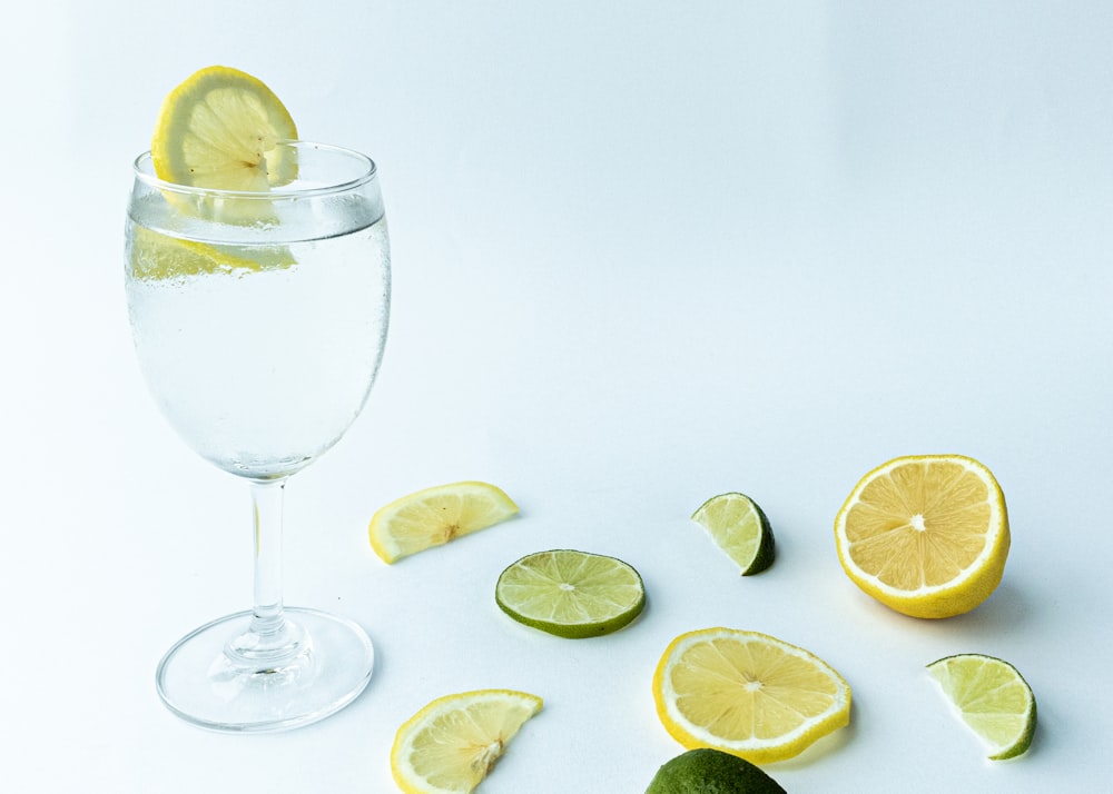 clear wine glass with sliced lemon