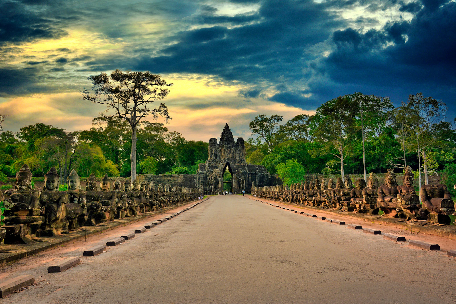 The road approaching an old gate near Siem Reap