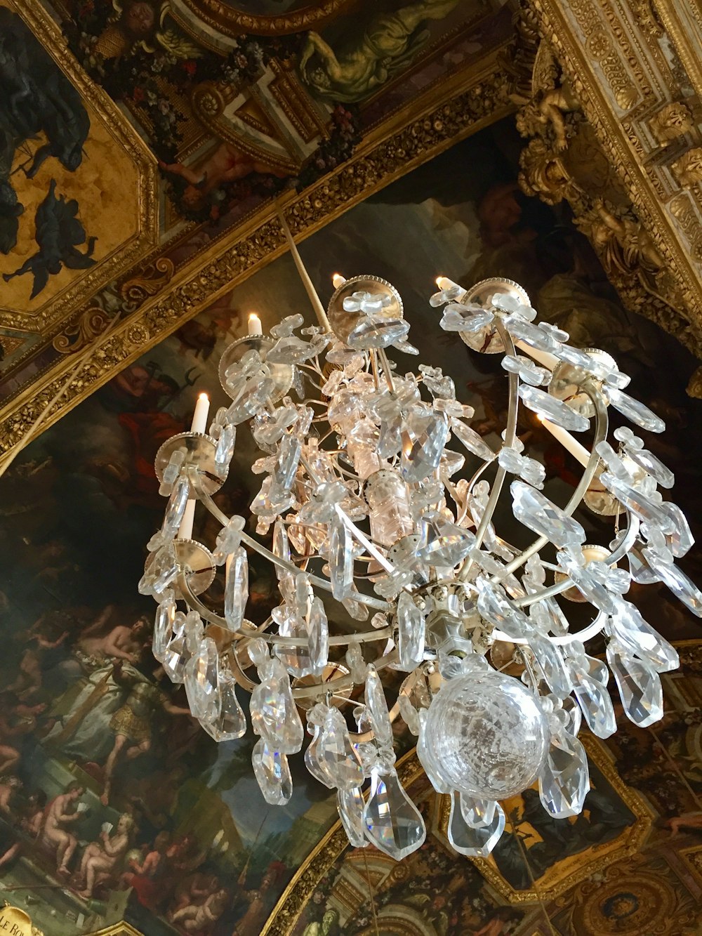 clear glass chandelier on ceiling