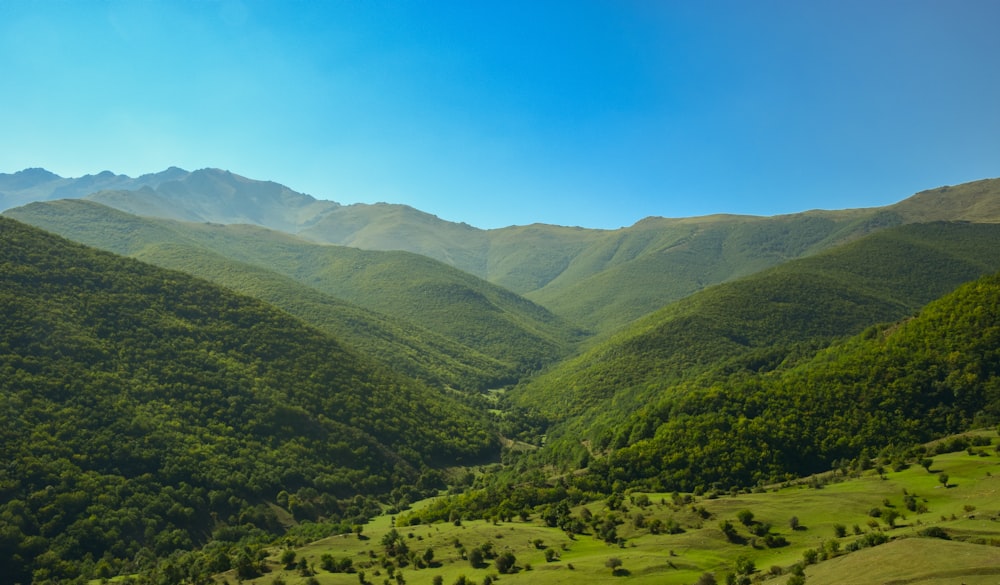 green mountains under blue sky during daytime