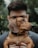 man in black suit jacket holding brown short coated dog