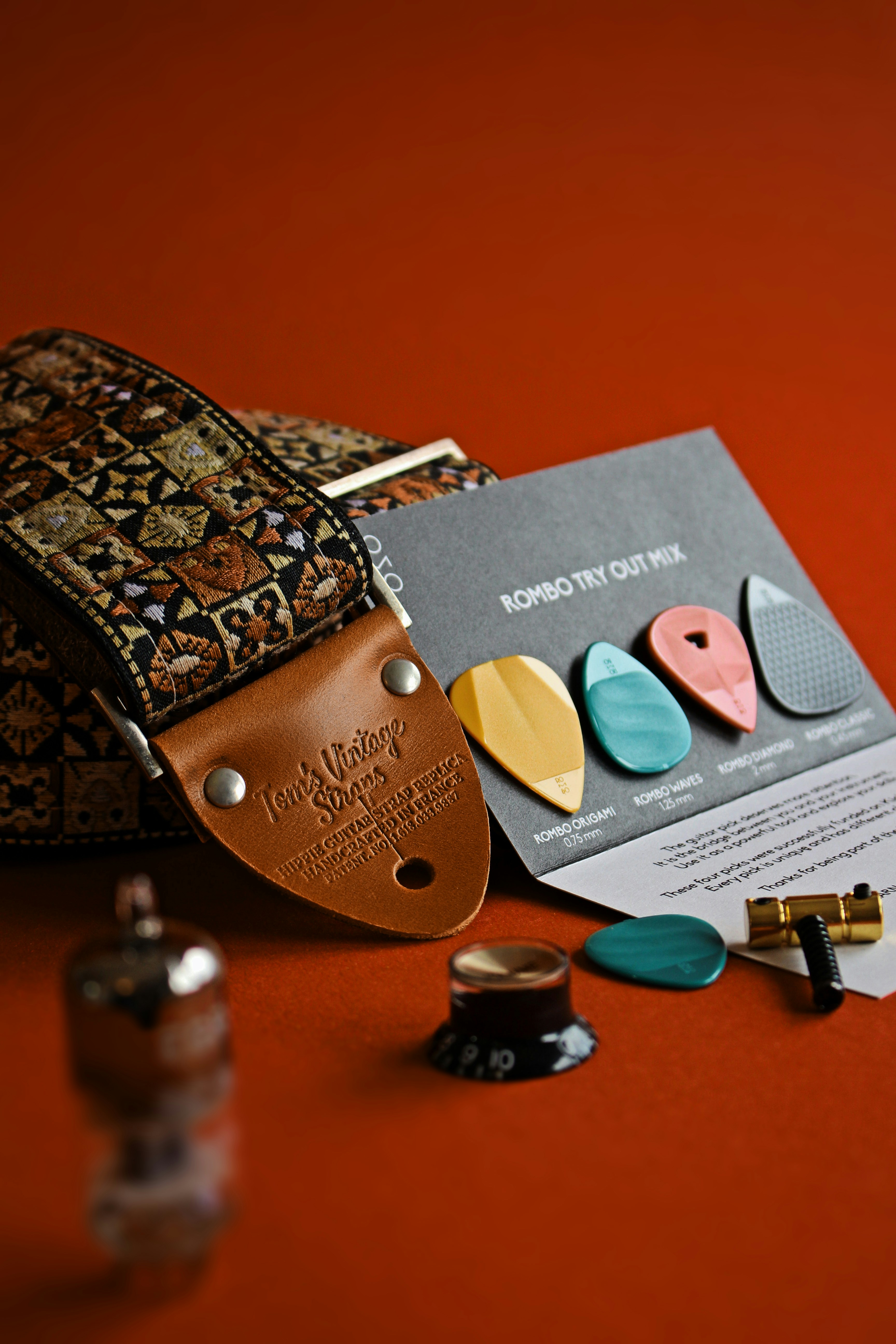 brown leather bag on white paper