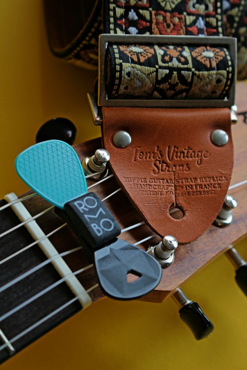 brown and black guitar headstock