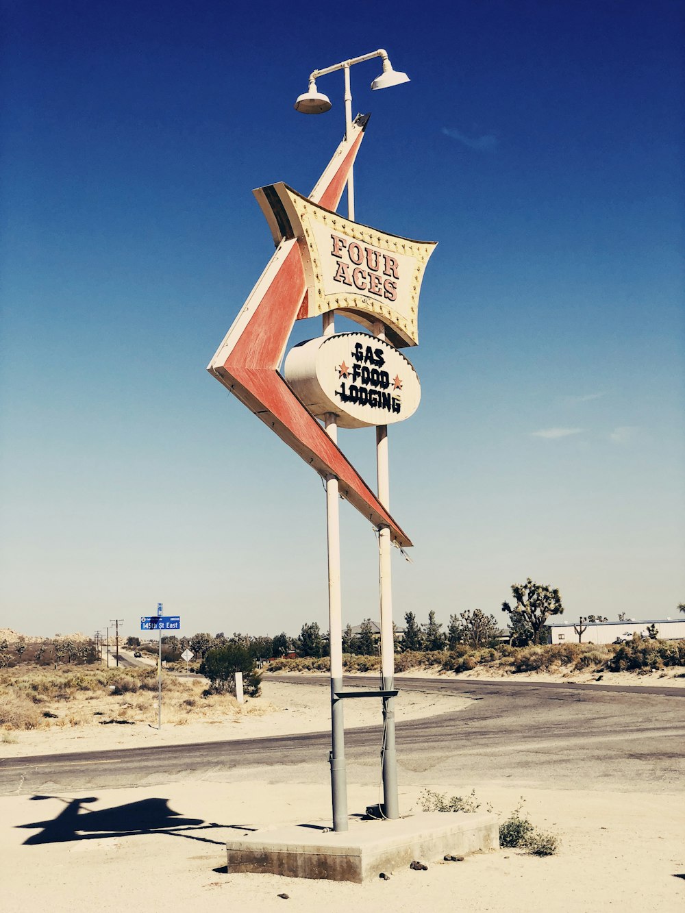 brown and white wooden signage