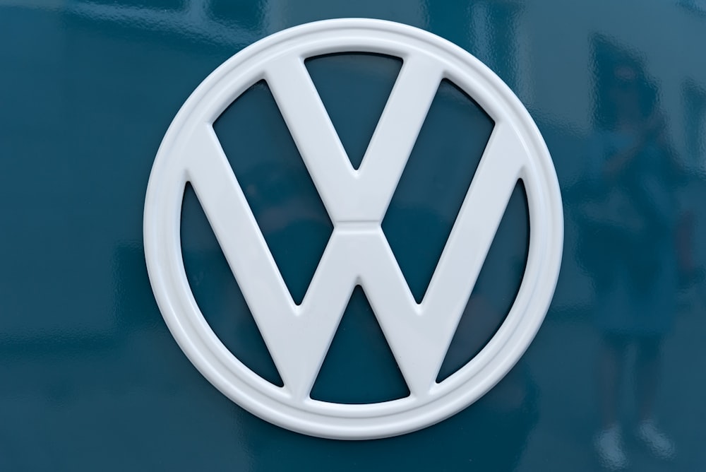 Volkswagen logo brand car symbol with name blue Vector Image