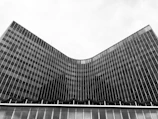 High-resolution photo of a sleek modern office building with clean lines and glass facade.