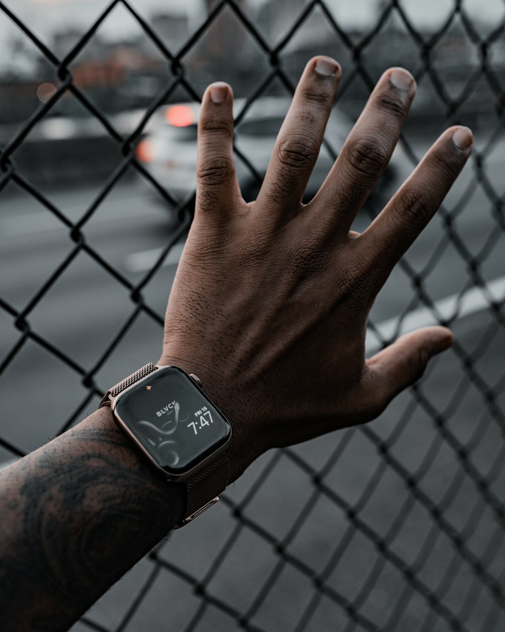 person wearing black smart watch