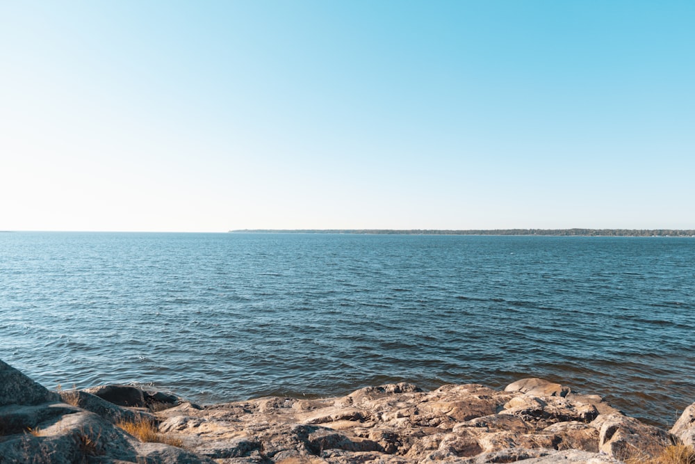 blue sea under blue sky during daytime