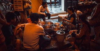 An event space filled with soul food lovers enjoying a tasting event.