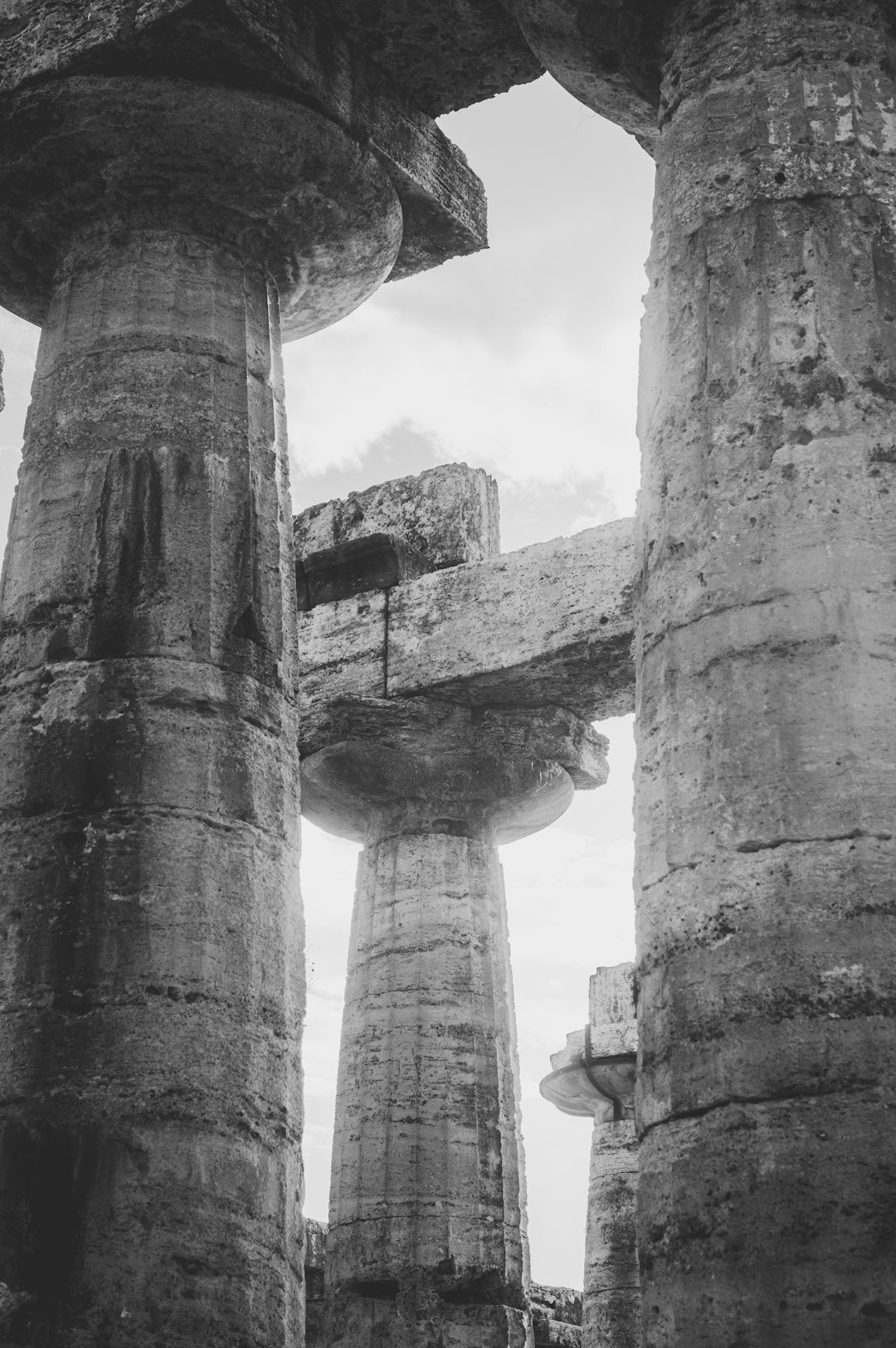 grayscale photo of concrete pillar
