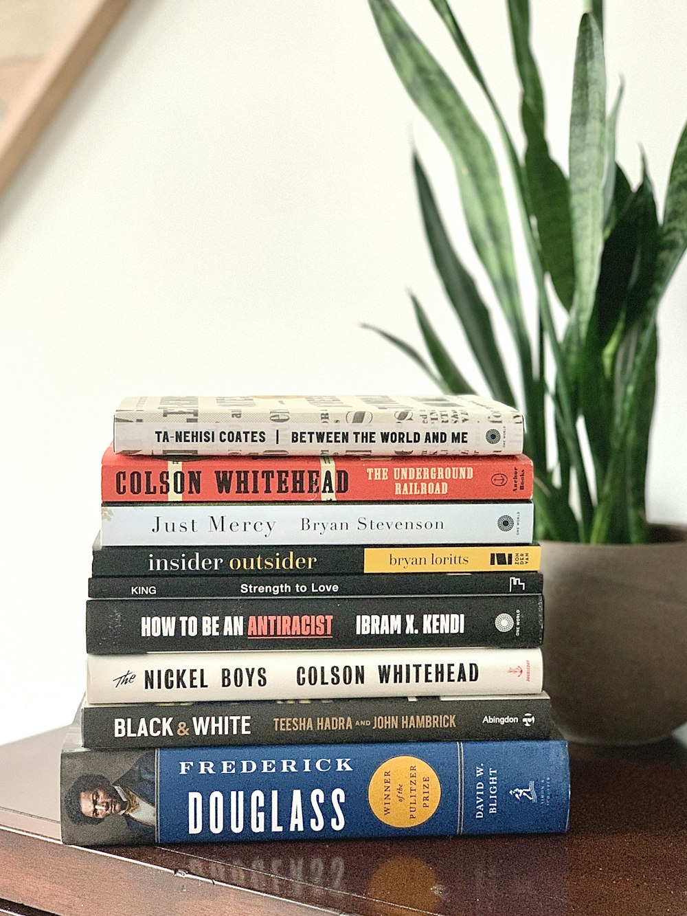 stack of books on white table