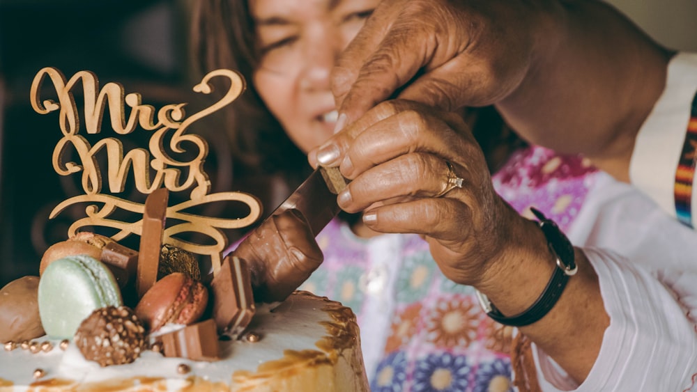 person holding brown and silver smoking pipe