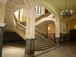 white concrete building with staircase