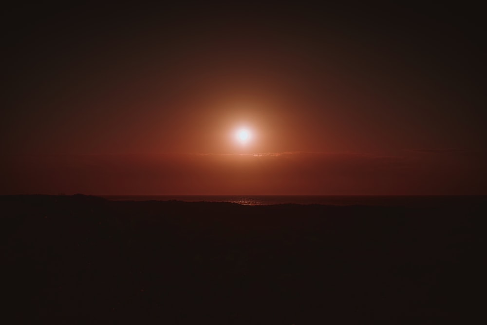 sun setting over the horizon