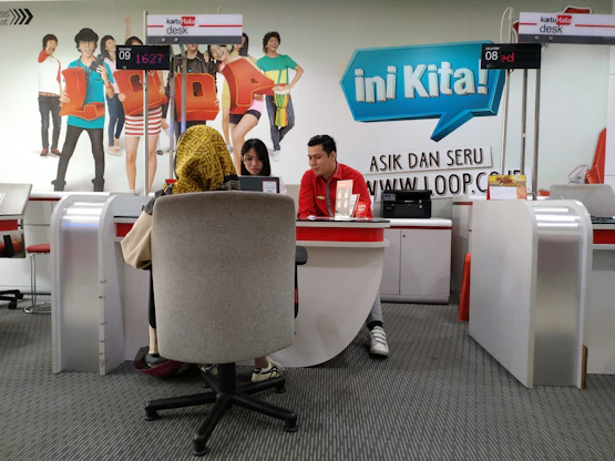 A friendly team member at AM Consulting Group ready to assist clients with advertising solutions.