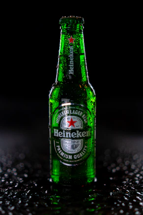 heineken bottle on black and white marble table