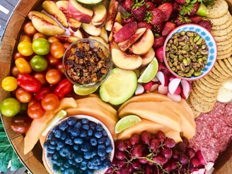 sliced fruits on brown wooden table