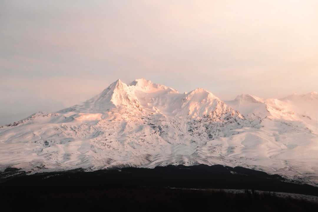 snow covered mountain during daytime