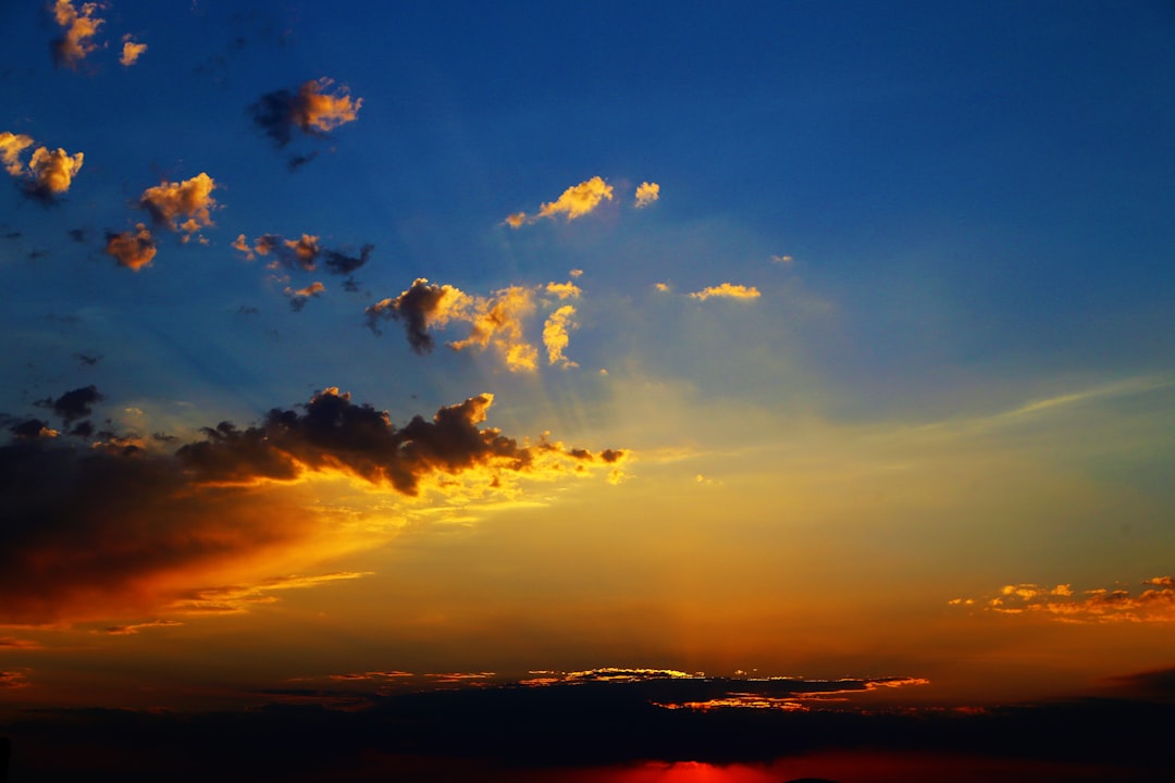 silhouette of clouds during sunset