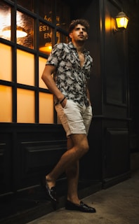 a man standing in front of a building