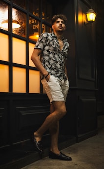 a man standing in front of a building