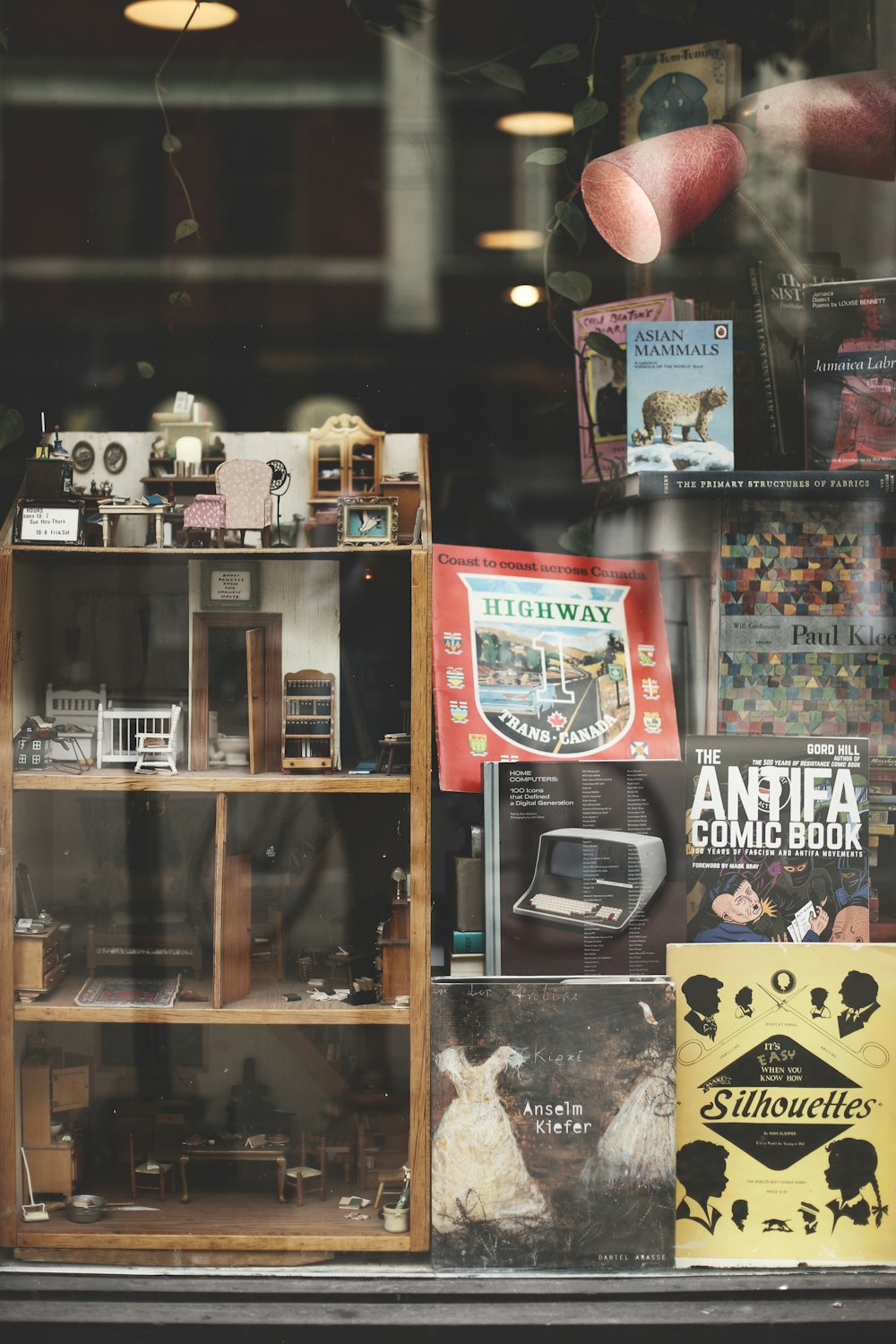 a store window with a bunch of items in it