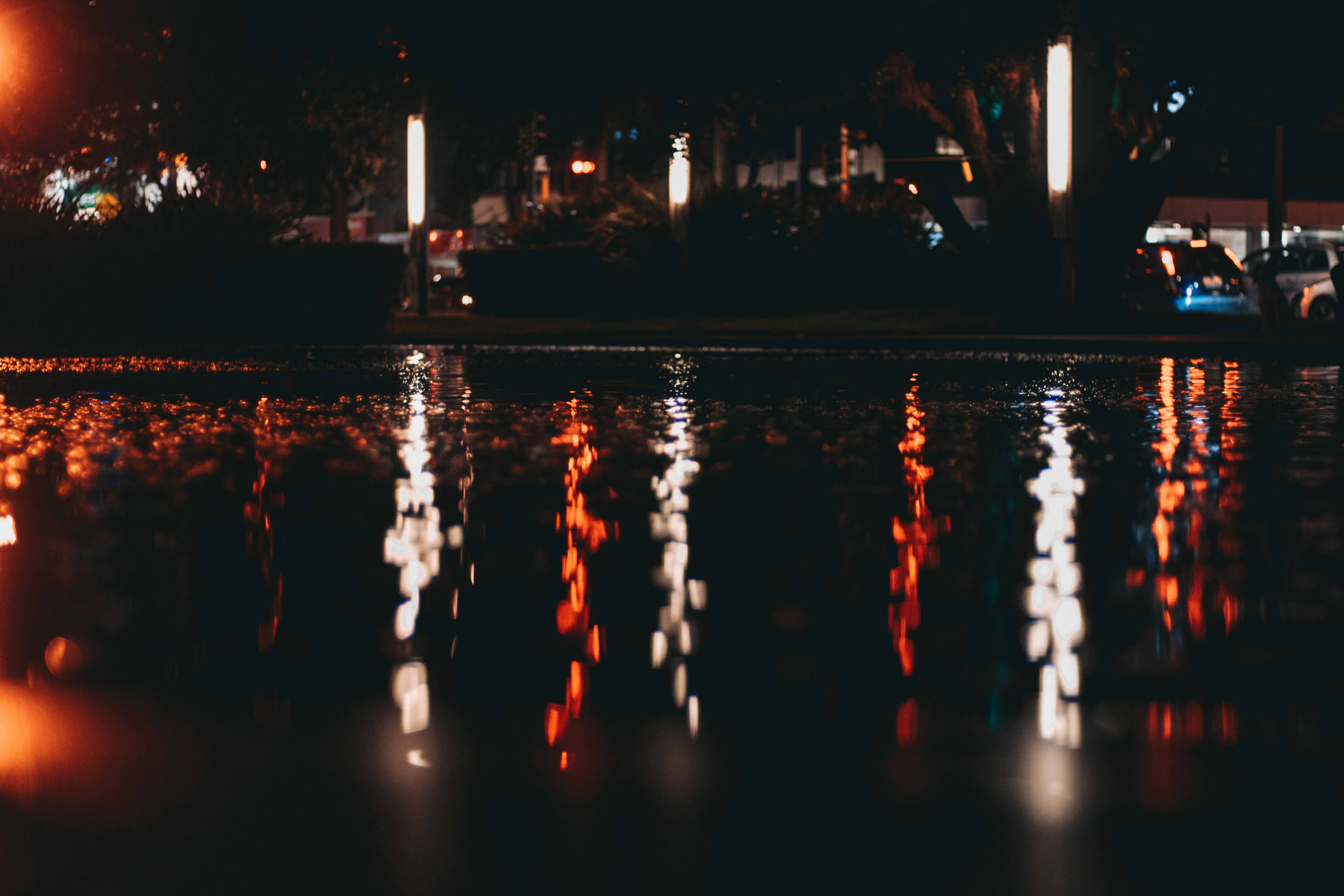 water fountain in the city during night time