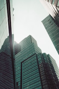 low angle photography of high rise buildings