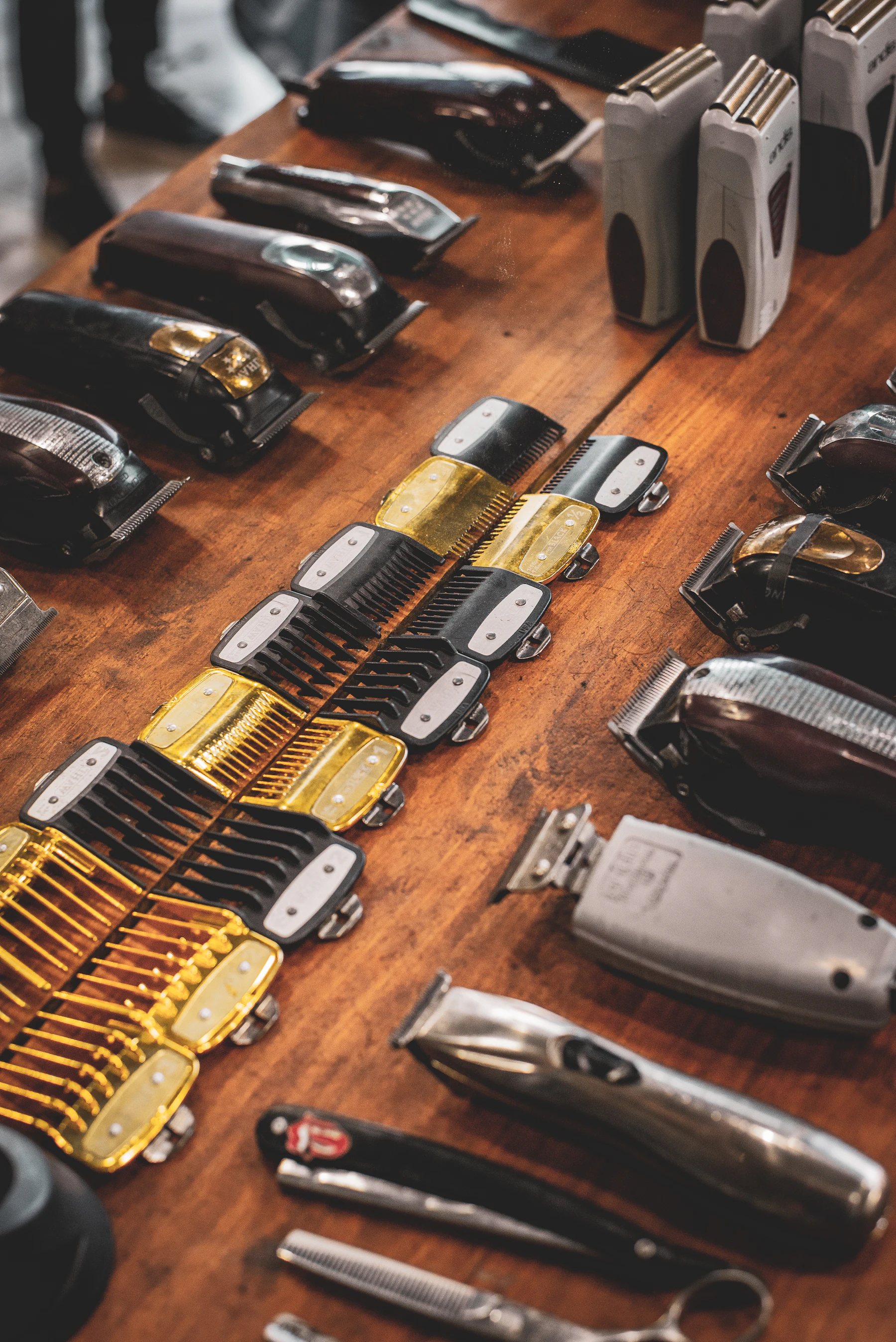 Rows of professional clippers and styling tools