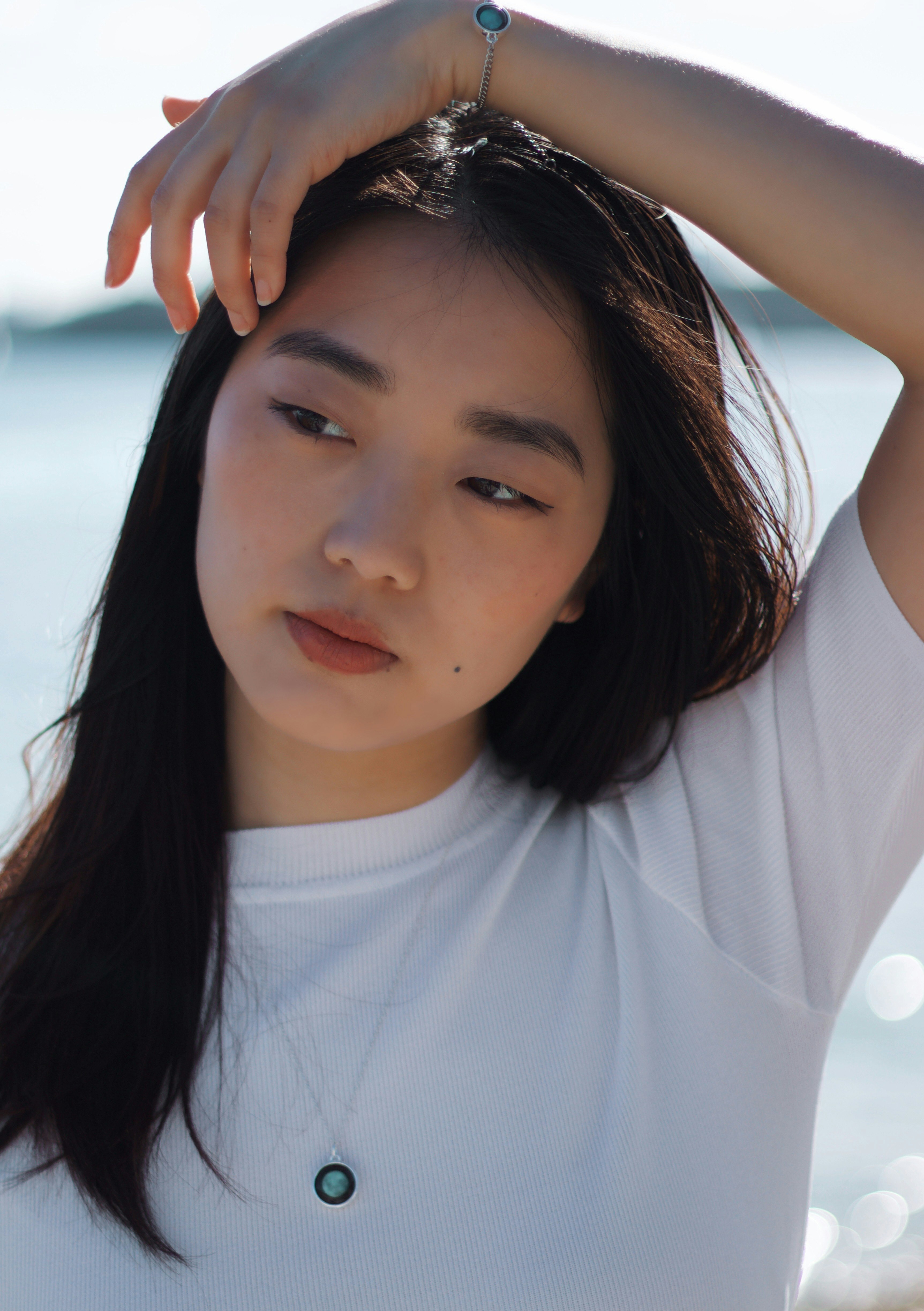 woman in white crew neck shirt