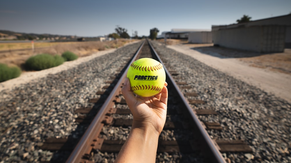 yellow and green tennis ball