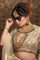 woman in white lace dress wearing black sunglasses