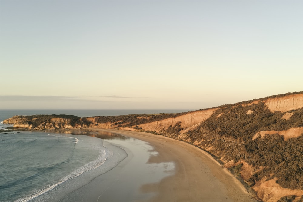 brown sand beach during daytime