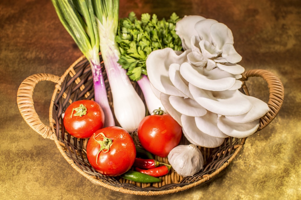 white garlic on brown woven basket