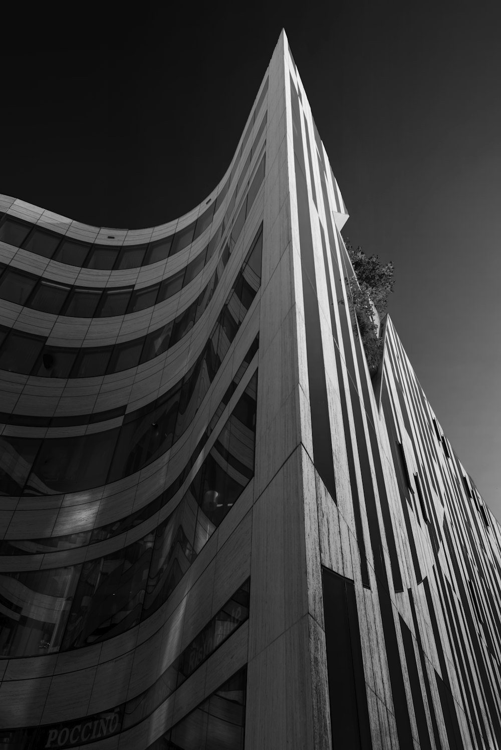 grayscale photo of high rise building