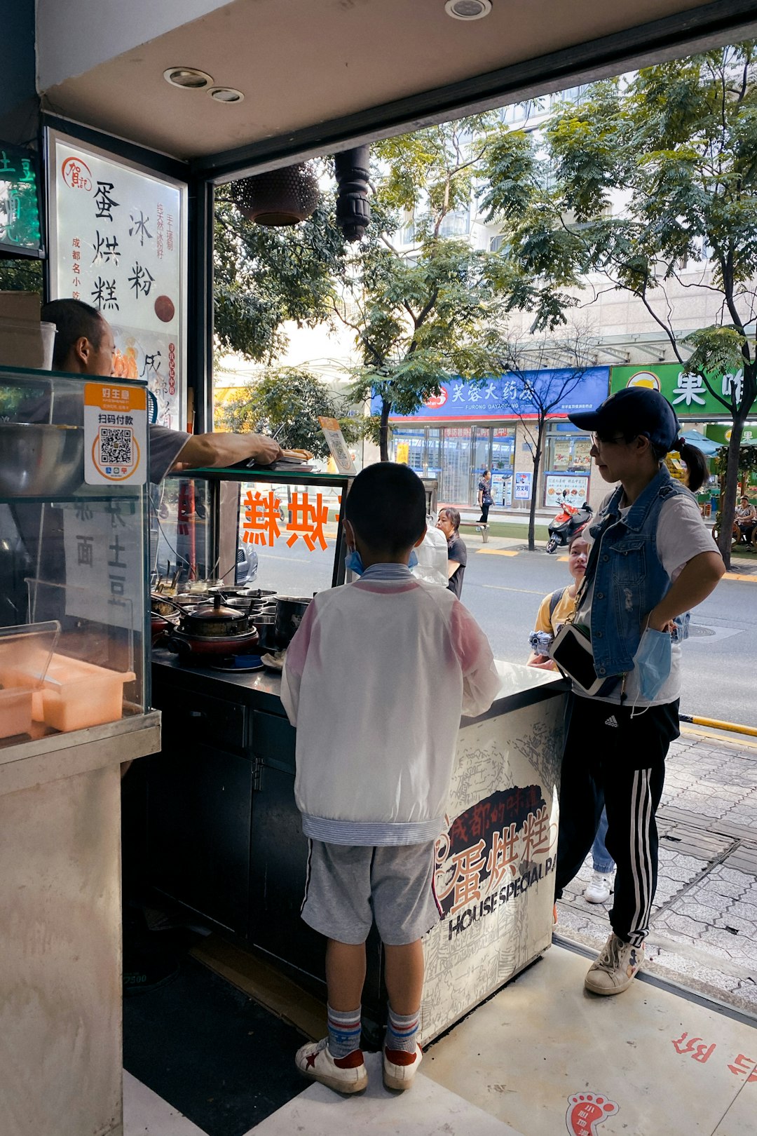 woman in white shirt standing near woman in white shirt