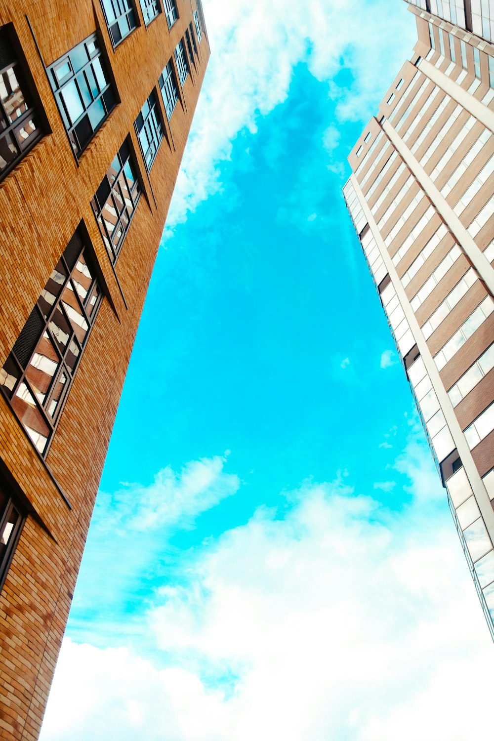 brown concrete building under blue sky during daytime