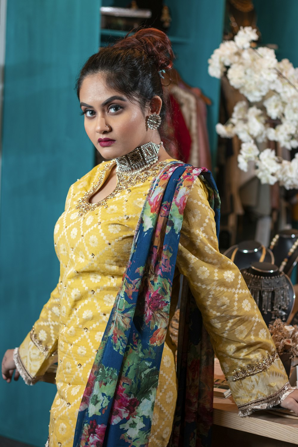 woman in yellow and blue sari dress