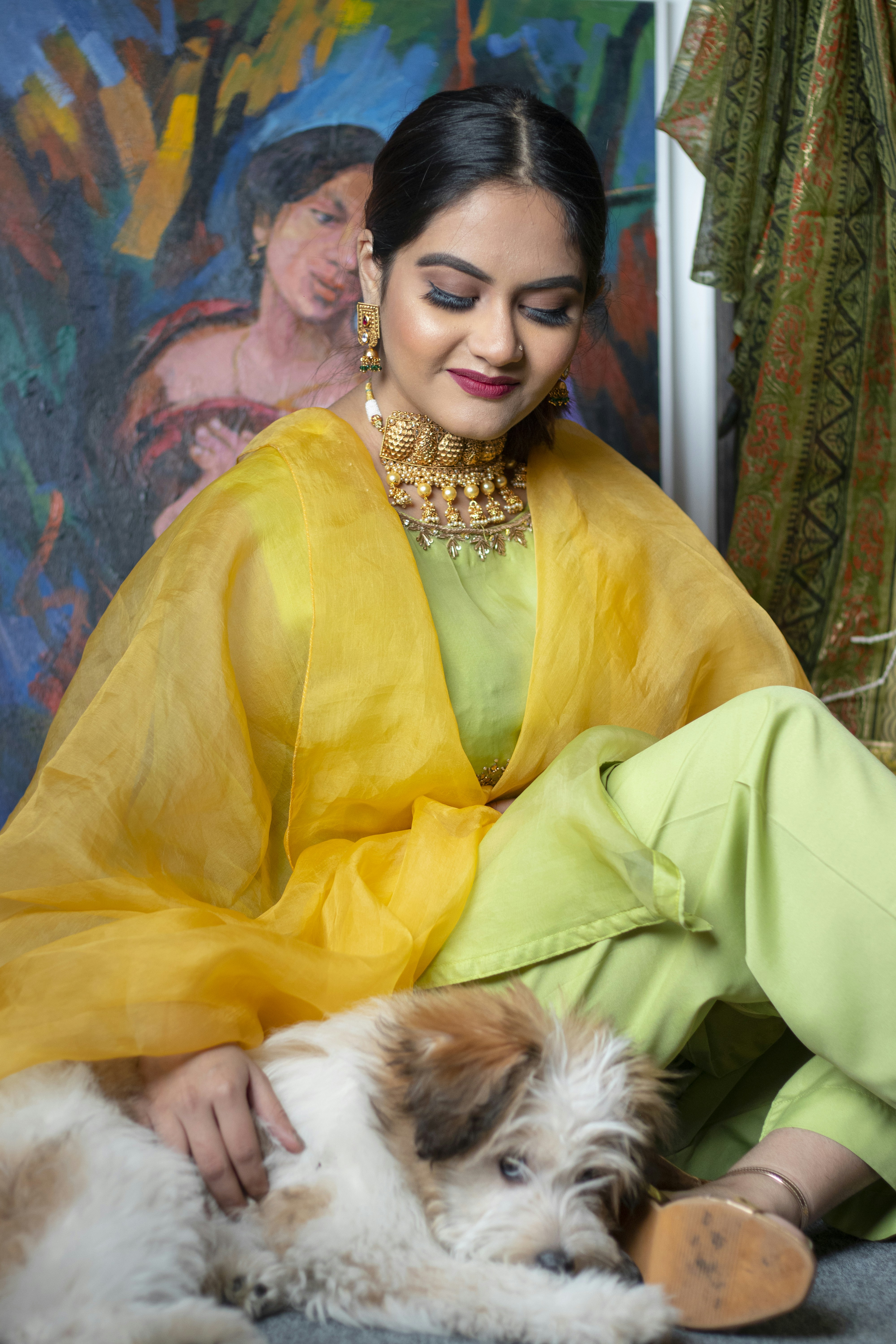 woman in yellow robe smiling