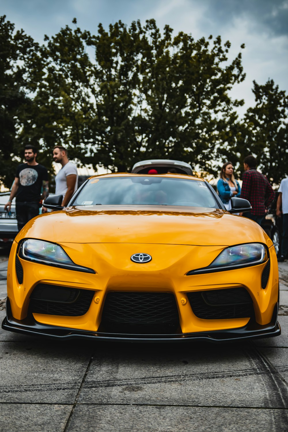 orange lamborghini aventador on road during daytime