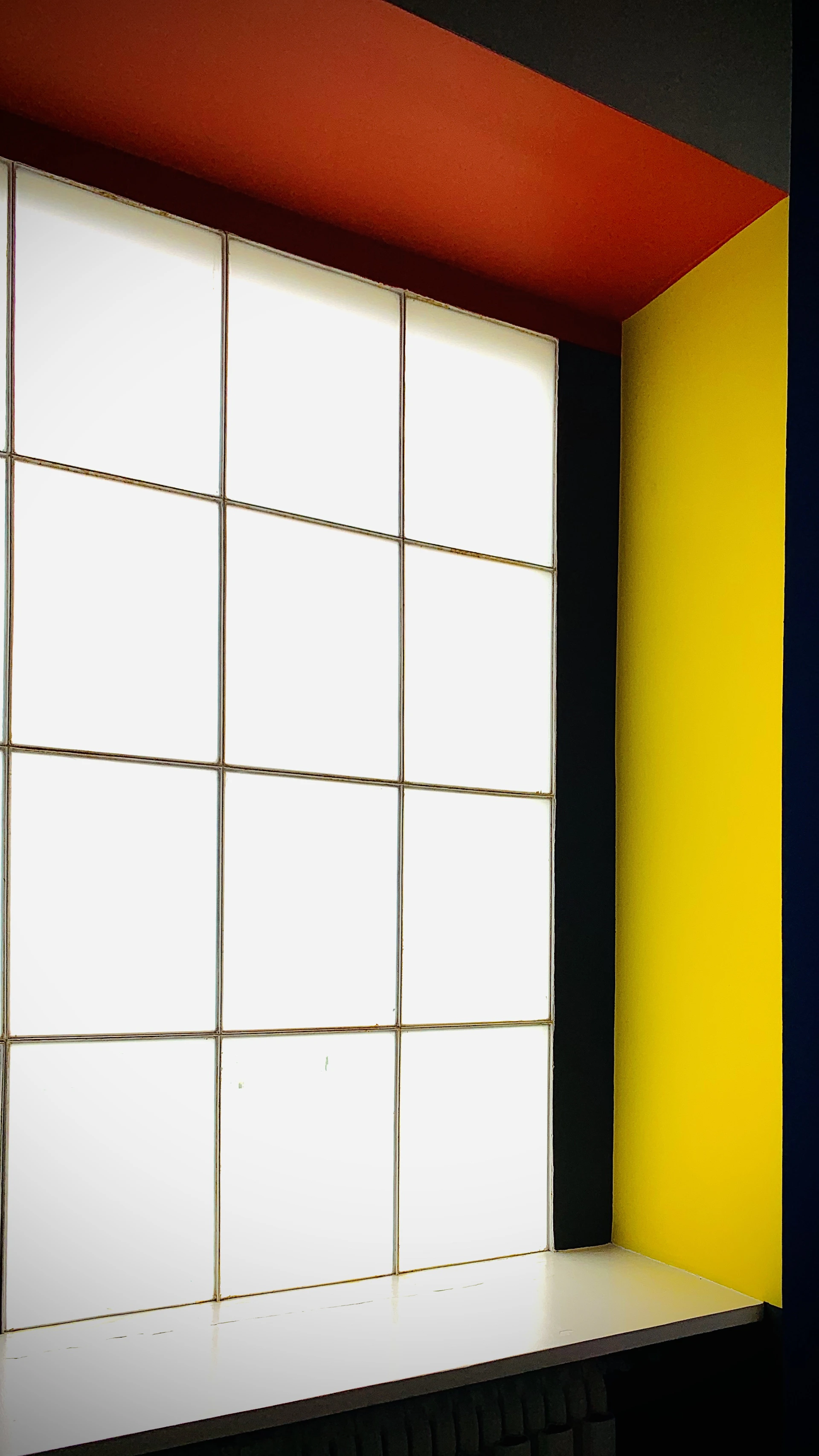 A captivating frame from a real estate promotional video featuring a bright, stylish interior with black, white, and yellow design elements.