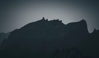 Wide shot of Angolan landscape at dusk, evoking a cinematic mood.